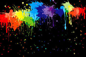 splatters of paint on a black background splatters of paint on a black background